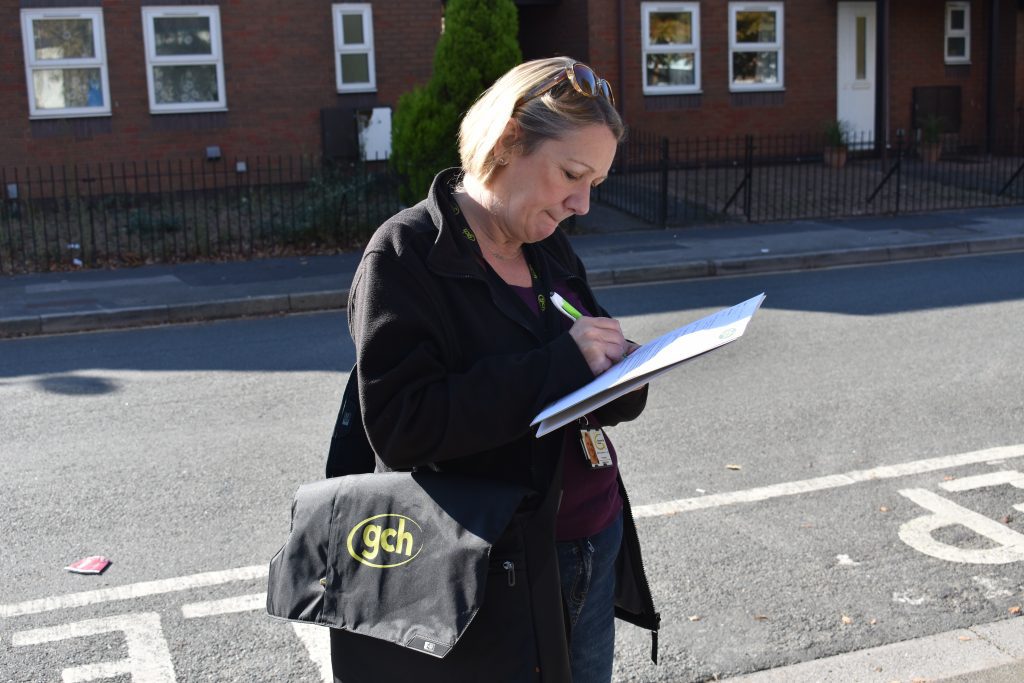 A member of GCH staff during an Estate Walkabout in Kingsholm, Gloucester