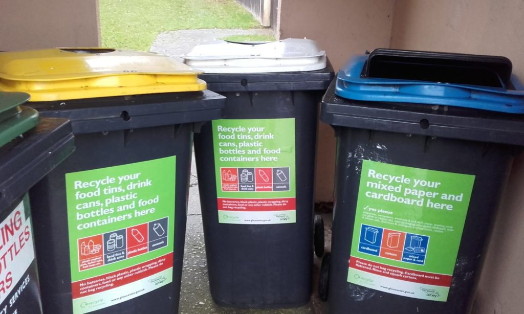Recycling bins promoting separating recycled waste