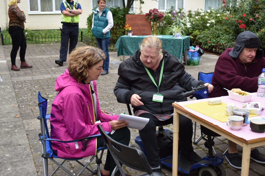 GCH staff talking to residents at Community Event