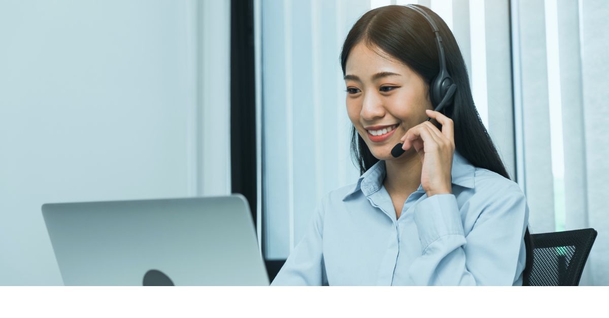 image showing woman wearing a phone headset