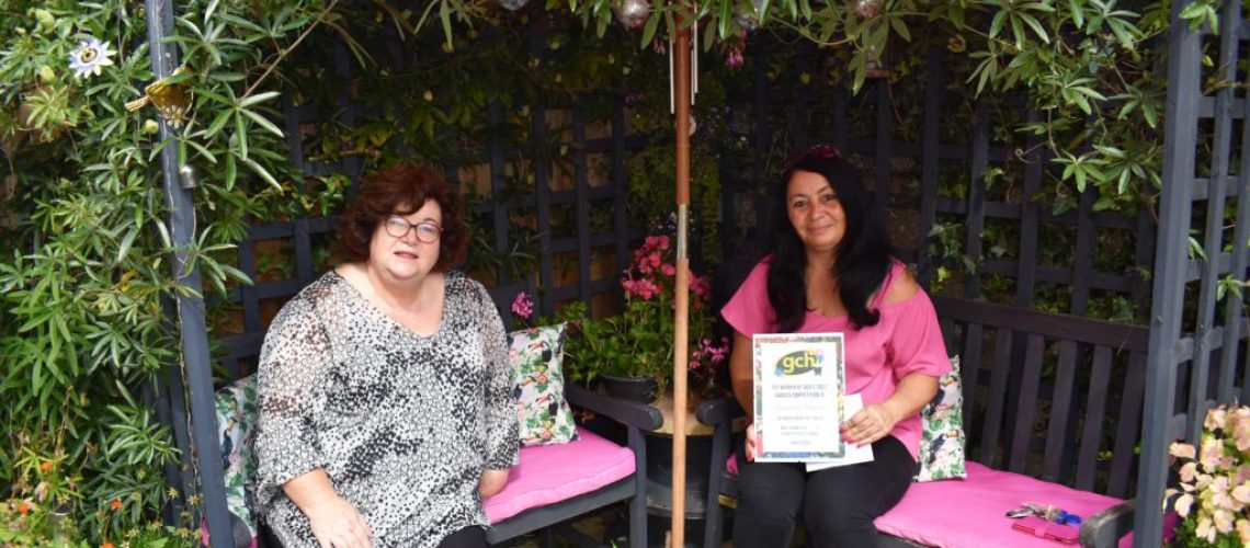 Winner of the Garden Competition Catarina sat with Anita Pope, Director of Housing & Communities